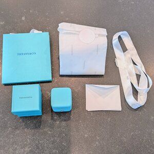 Authentic unused Tiffany packaging and ring box